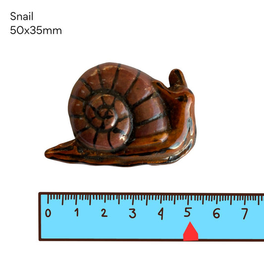 Snail-  pottery (50x35mm)